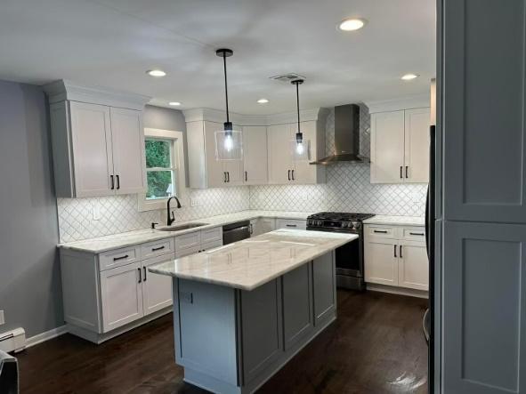 Kitchen remodel with dark hardwood and a marble island