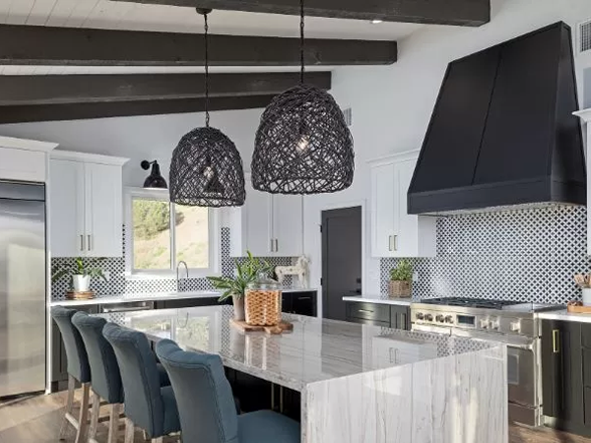 Remodeled kitchen with a marble island